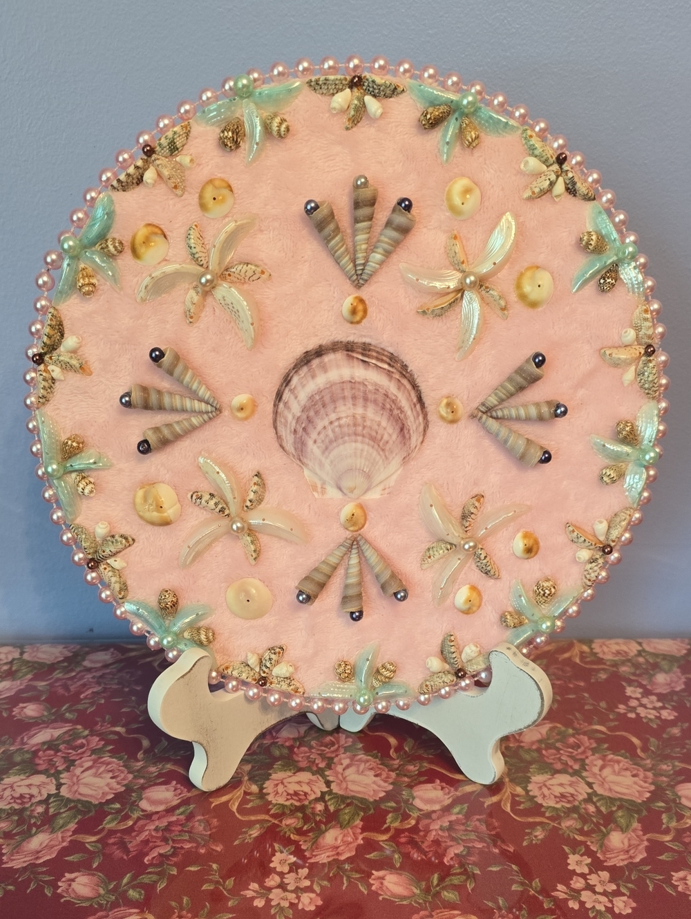 Handmade Shell Art On Pink Background